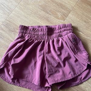 Dark pink Lululemon athletic shorts
